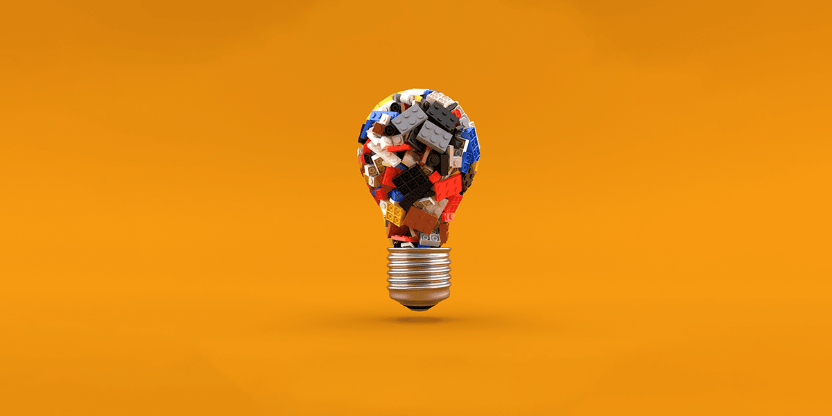 image of a lightbulb containing plastic toy bricks